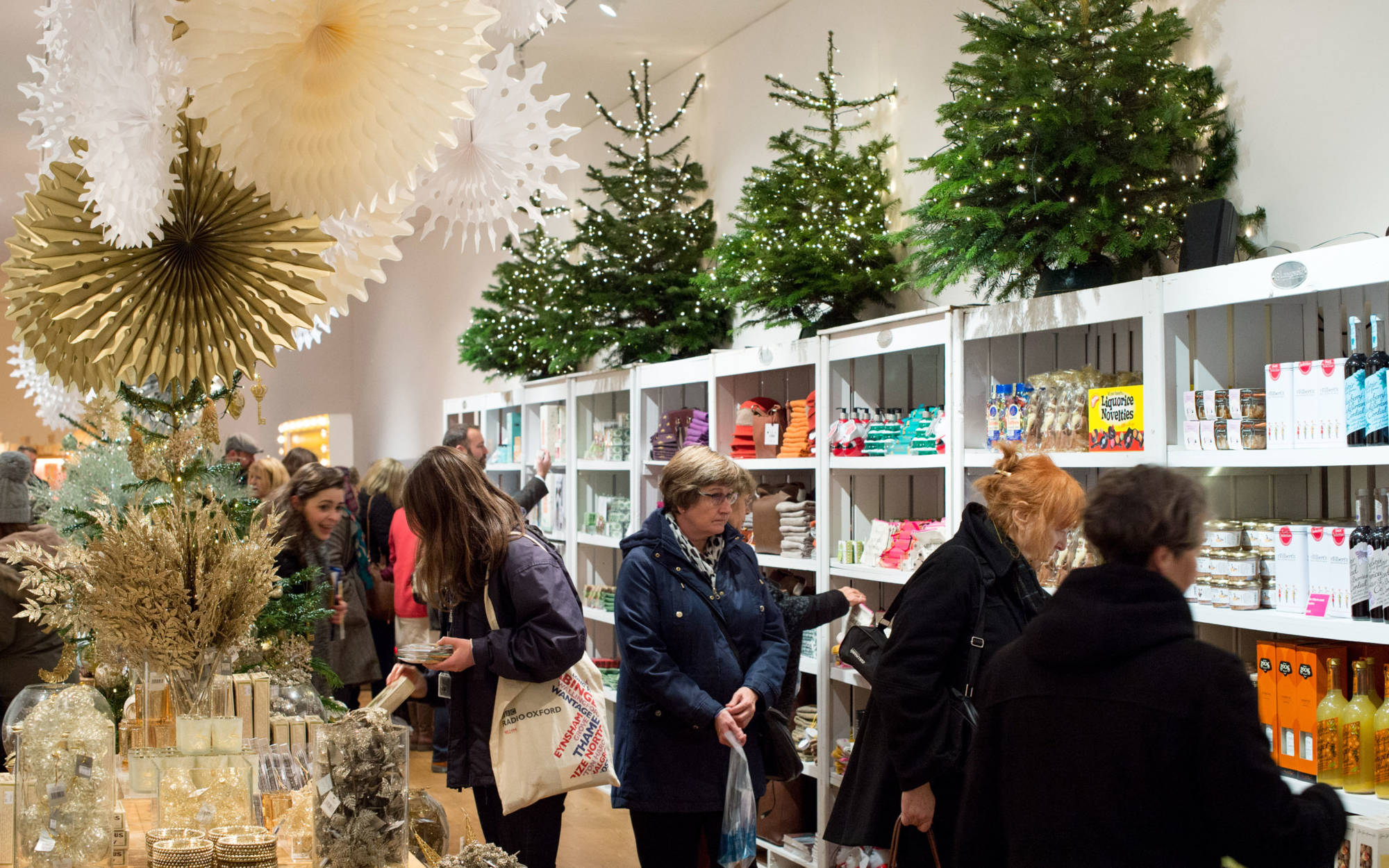 Visitors in the Christmas Stables shop