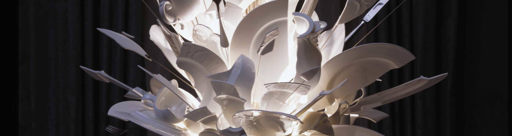 Chandelier made of broken porcelain and pieces of cutlery titled Porca Miseria