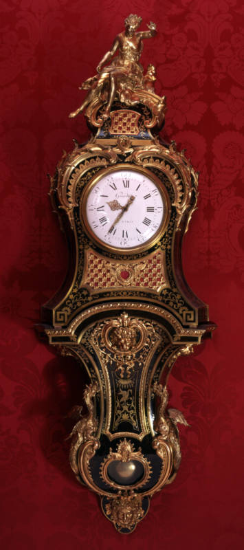 A cartel clock of serpentine form