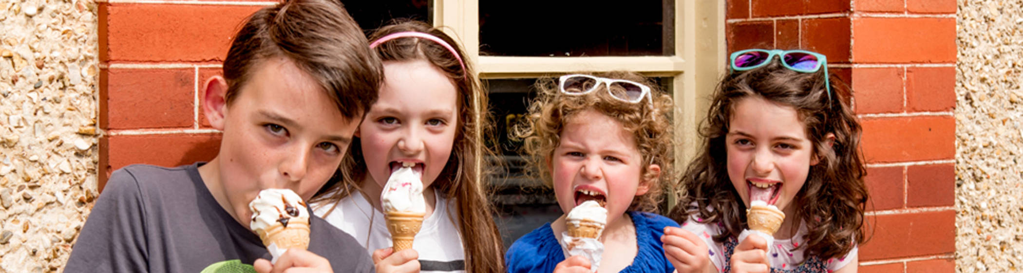 Children eating ice cream at the Stables