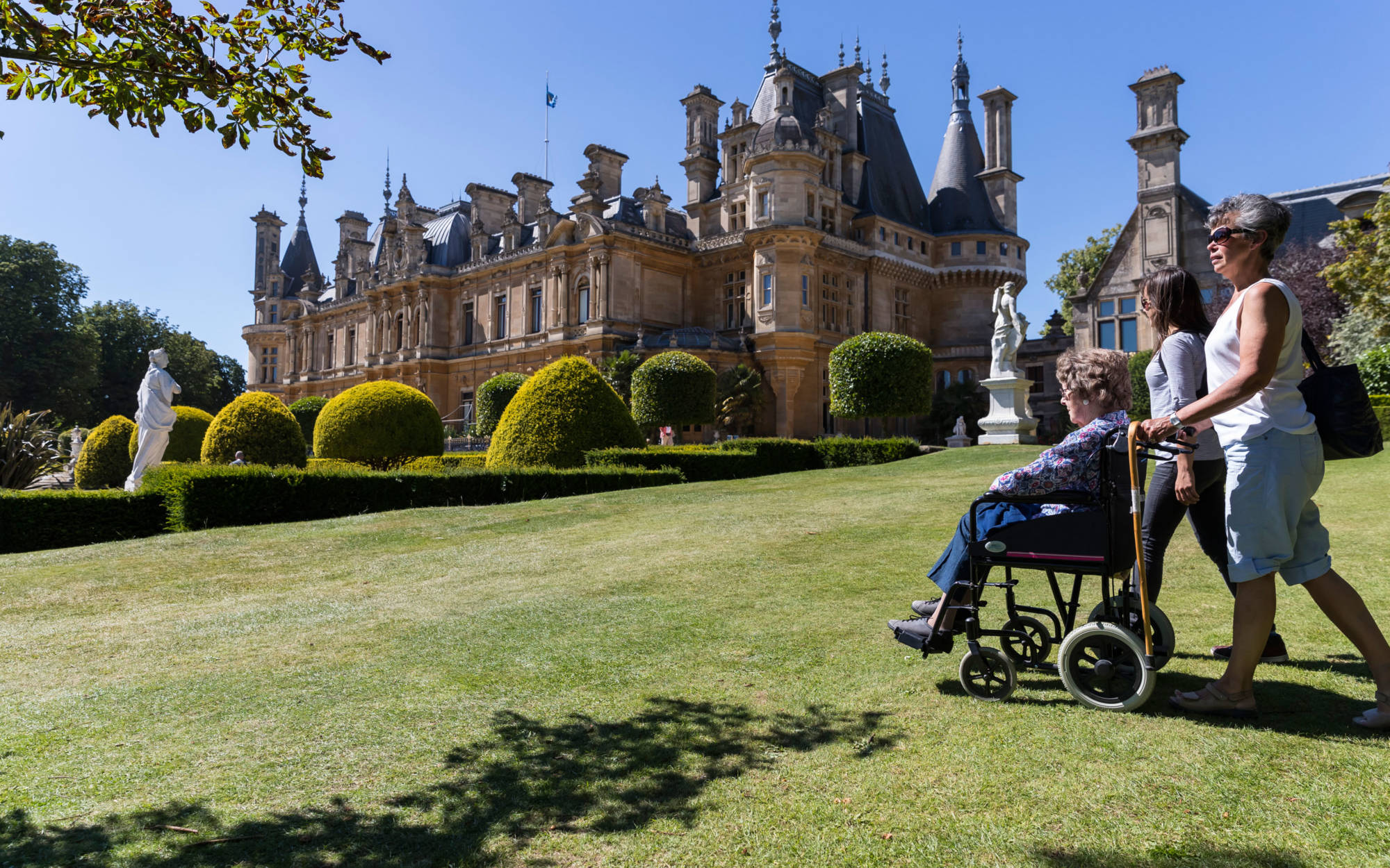 Visitor in a wheelchair on the south lawns