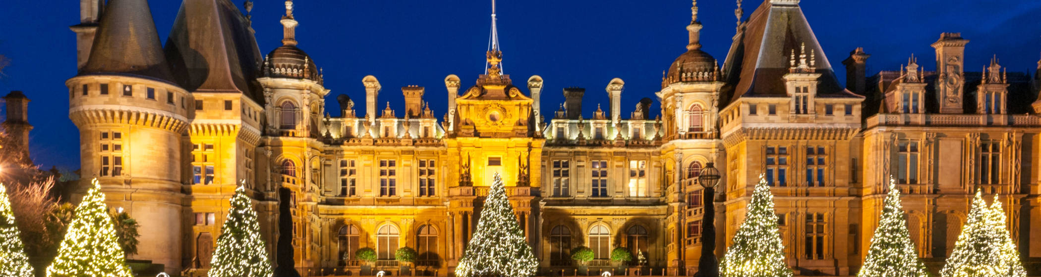 North front with illuminated christmas trees