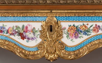 Rectangular fall-front desk made by Martin Carlin with gilt-bronze mounts and ten Sèvres plaques with turquoise borders and baskets of flowers, c. 1775