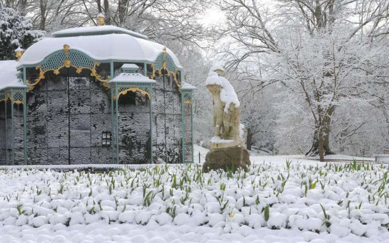 Snow covered aviary garden
