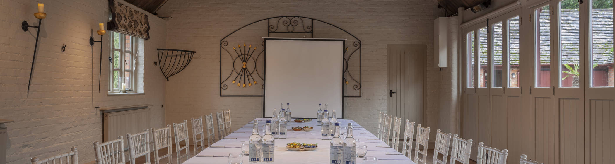 The Five Arrows Coach House set up for a meeting.